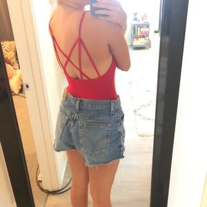 Red strappy bodysuit